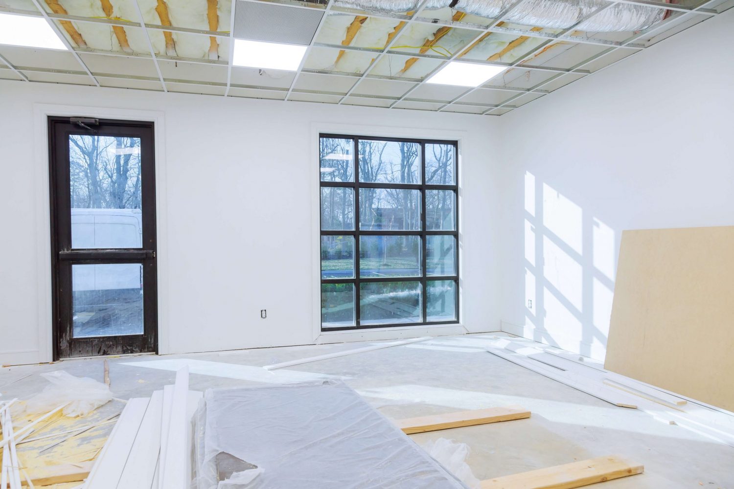 Metal frame ceiling. Sound proof tiles installation